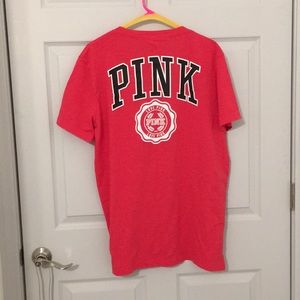PINK shirt sleeve t-shirt.